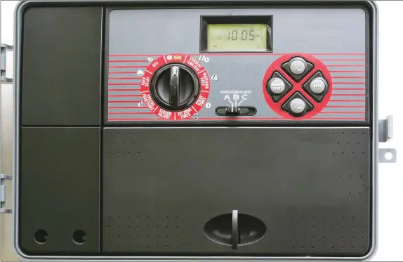  ??  ?? Putting sprinklers on a timer can keep your water output consistent and keep you from having to monitor its progress.