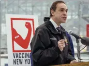  ?? THE ASSOCIATED PRESS FILE ?? Commission­er of Health for New York State Howard A. Zucker speaks to reporters during a news conference at a New York State COVID-19 vaccinatio­n site in the Jacob K. Javits Convention Center earlier this month.