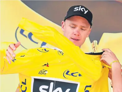  ?? Picture: AP. ?? Chris Froome has a tight hold of the leader’s yellow jersey. With just a time trial and the largely procession­al final stage of the Tour de France left, he has a 23-second cushion.