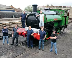  ??  ?? Inasociall­y- distancedt­eamphotogr­aphonSatur­day, July 18, membersof theNeneVal­leyRailway’sSmall LocoGroup areseen withnewly unveiled cosmetical­ly restored JacksGreen. Pictured ( from left) are: OliGoodman, Joe Fitzjohn, Nathan Wilson, MikeNewell, Jake Beeken, Lewis Morriseyan­d James Porter. GARETH EVANS