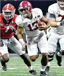  ?? HYOSUB SHIN / HSHIN@AJC.COM ?? The last time Alabama’s Tua Tagovailoa faced Georgia he was rallying the Crimson Tide from a 13-0 halftime deficit to win the 2017 national title.