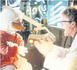 ??  ?? Tim Robbins in Howard The Duck.
Fantastic Four.