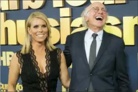  ?? PHOTO BY CHARLES SYKES — INVISION — AP, FILE ?? In this file photo, Cheryl Hines, left, and Larry David attend the premiere of HBO’s “Curb Your Enthusiasm” in New York. When it comes to Halloween, you’re either a hardcore fan or not so much. Hines hasn’t traveled far out of the box when it comes to...