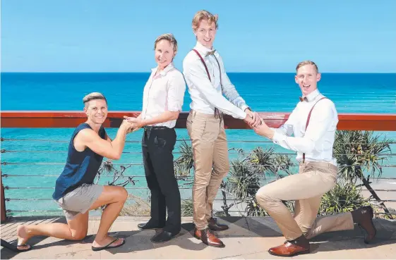  ?? Picture: RICHARD GOSLING ?? Zoe Nolan and Michelle Edwards, and Luke Sullivan and Craig Burns, who will marry next month, at Rainbow Bay Lookout.