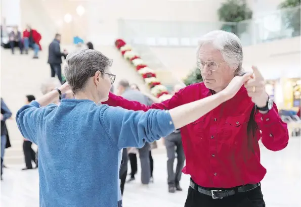  ?? PHOTOS: CODIE MCLACHLAN ?? Judy Pachal and Doug Pachal kick up their heels Jan. 6 during the first Swingin’ City Sunday of the year at City Hall.