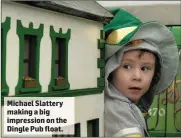  ?? Michael Slattery making a big impression on the Dingle Pub float. ??