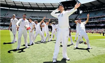  ??  ?? Glory days: Graeme Swann leads the England team in their famous ‘sprinkler’ celebratio­n in Melbourne on the 2010-11 tour