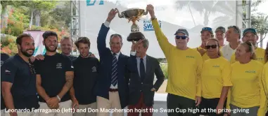  ??  ?? Leonardo Ferragamo (left) and Don Macpherson hoist the Swan Cup high at the prize-giving