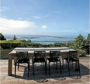  ??  ?? The outdoor living area on the top floor showcases the best views of the sea.