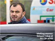  ??  ?? Making money: Selami Cokaj at his car wash