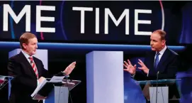  ??  ?? Taoiseach Enda Kenny and Fianna Fáil leader Micheál Martin during the last TV debate on RTE’s ‘Prime Time’ before the general election in 2016