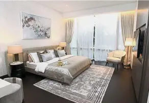  ??  ?? Comfy: A bedroom view at the luxury residences show unit.