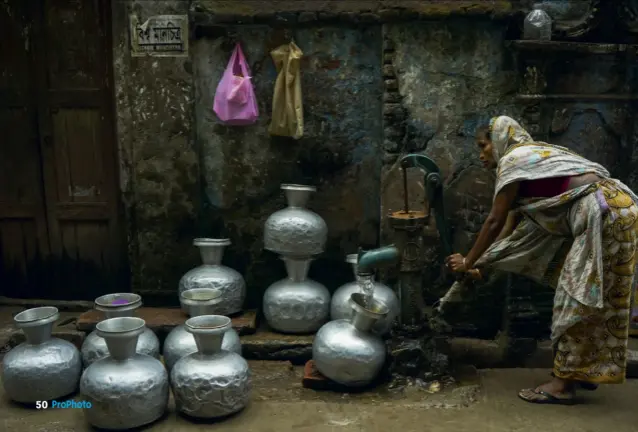  ??  ?? Water Collecting by Kazi Mushfiq (Bangladesh), winner of the 'Philip Harben Award For Food In Action' category, Pink Lady® Food Photograph­er Of The Year 2019.