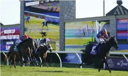  ?? ?? Ryan Moore rides Meditate to victory in the Juvenile Fillies’ Turf race at the Breeders' Cup meeting at Keenelend in Kentucky. Photograph: Jeff Roberson/AP