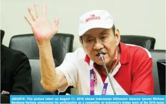  ??  ?? JAKARTA: This picture taken on August 11, 2018 shows Indonesian billionair­e tobacco tycoon Michael Bambang Hartono announcing his participat­ion as a competitor on Indonesia’s bridge team at the 2018 Asian Games in Jakarta. —AFP