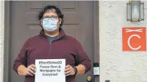  ?? Hyoung Chang, The Denver Post ?? Revvy Broker, 30, stands in front of his apartment door on Friday in Lone Tree. Renters are desperate as April 1 payment deadline looms. Some are organizing a rent strike and others are pushing for a rent freeze.