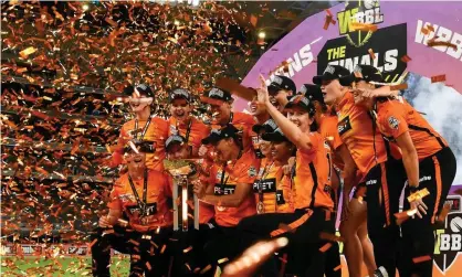  ?? Photograph: Stefan Gosatti/Getty Images ?? The Perth Scorchers celebrate after winning Saturday’s Women's Big Bash League final against the Adelaide Strikers at Optus Stadium.