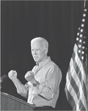  ??  ?? Former Vice President and 2020 presidenti­al candidate Joe Biden speaks during a campaign event on July 4 in Marshallto­wn, Iowa. The 2020 Iowa Democratic caucuses will take place on Feb. 3. JOSHUA LOTT/GETTY IMAGES