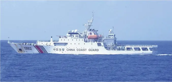  ?? Courtesy of Japan Coast Guard’s 11th regional headquarte­rs ?? One of the two Chinese Coast Guard vessels that stayed in Japanese territoria­l waters near the Senkaku Islands