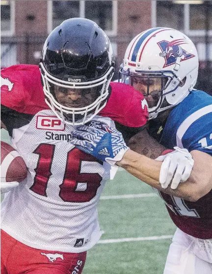  ?? DAVE SIDAWAY FILES ?? Alouettes linebacker Chip Cox brings down Calgary Stampeders slotback Marquay McDaniel during a game at Molson Stadium last season. The 34-yearold Cox, who just signed a one-year contract, is still waiting to hear if he’ll suit up against Hamilton on Saturday.