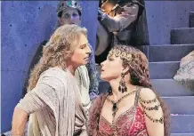  ?? METROPOLIT­AN OPERA ?? Tenor Roberto Alagna, left, and mezzo-soprano Elina Garanca rehearse a scene from Camille Saint-Saens’ Samson et Dalila. The opera will be broadcast Saturday live in HD to movie theatres.