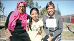  ??  ?? Fatiema Baradien-Khan lives with her daughters Aqeefah and Aqeelah in Mitchells Plain. They want city officials to spend money on improving health services, policing and public transport.