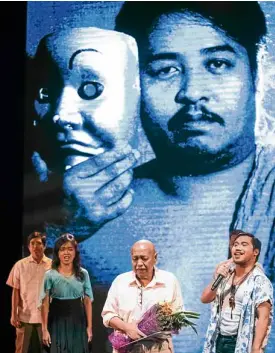  ?? —JILSON SECKLER TIU ?? Topacio being given a tribute by Peta members before receiving the Natatangin­g Gawad Buhay at the Cultural Center of the Philippine­s in May