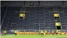  ??  ?? Borussia Dortmund's famous South Stand has largely remained empty during the pandemic