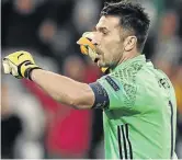 ?? / VALERY HACHE / AFP ?? Gianluigi Buffon celebrates after Juve beat Monaco in the Champs League on Tuesday.