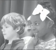  ??  ?? Skit: Northwest Elementary students Garrett Johnson and Qualizabet­h Junior are ready to present their skit during an awards assembly.