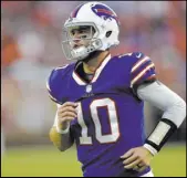  ?? David Richard The Associated Press ?? The Raiders traded with the Buffalo Bills for sixth-year quarterbac­k AJ McCarron, who will serve as Derek Carr’s backup this season.