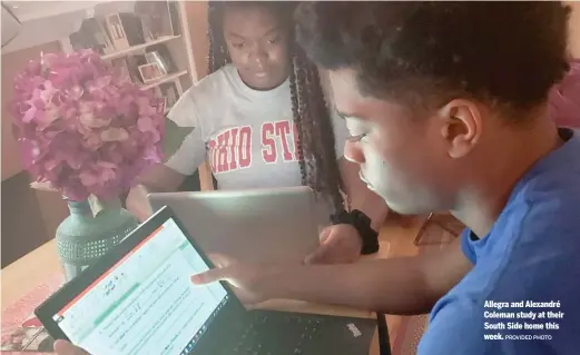  ?? PROVIDED PHOTO ?? Allegra and Alexandré Coleman study at their South Side home this week.