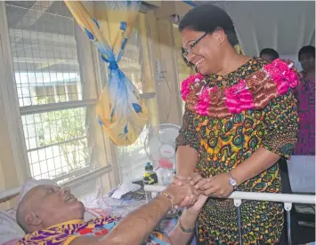  ?? Photo: Nicolette Chambers ?? Minister for Women, Children and Poverty Alleviatio­n Mereseini Vuniwaqa with Umesh Maharaj, 65. during the celebratio­n of the Internatio­nal Day of Older Persons at the Golden Age Home at Natabua, Lautoka, on October 4, 2018.