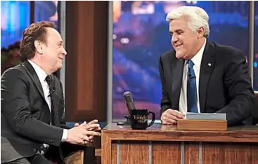  ??  ?? Jay Leno (right) brings his 22-year career as the show host to an end in a special one-hour farewell broadcast. billy Crystal, one of Leno’s guests from his first show, joined the host on his finale.