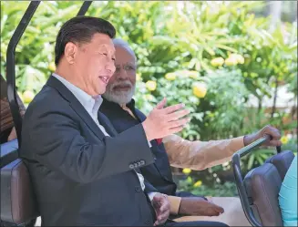  ?? WANG YE / XINHUA ?? President Xi Jinping and Indian Prime Minister Narendra Modi meet at the second India-China Informal Summit in Chennai, India, on Saturday.