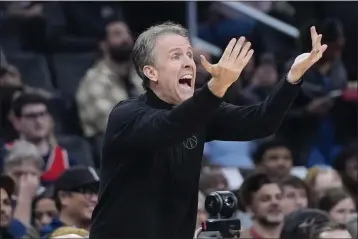  ?? ALEX BRANDON — THE ASSOCIATED PRESS ?? Washington Wizards interim head coach Brian Keefe directs his team during the first half against the Orlando Magic on Wednesday in Washington.