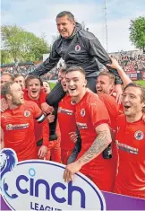  ?? ?? Bonnyrigg Rose manager Robbie Horn is hoisted shoulder-high by his players as they celebrate