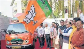  ?? ANI ?? BJP national president JP Nadda with Goa chief minister Pramod Sawant and others flags off the ‘Sankalp Rath Yatra’, in Panaji on December 22.
