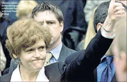  ??  ?? Victory salute: Deborah Lipstadt celebrates her libel win over David Irving