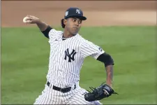  ?? ADAM HUNGER — THE ASSOCIATED PRESS ?? Yankees pitcher Deivi Garcia delivers against the Mets during the third inning of the second game of a doublehead­er.