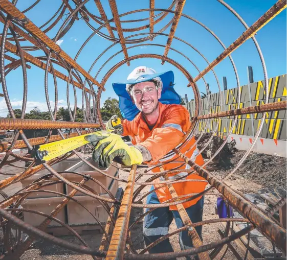  ?? Picture: Nigel Hallett ?? Corey Vogt is a leading hand from CPB Contractor­s and is thrilled to be kept busy on the light-rail project.