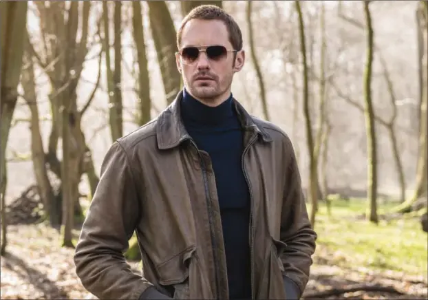  ??  ?? Alexander Skarsgård stars in “The Little Drummer Girl”