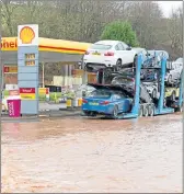  ??  ?? FLOODED: A garage off the A68 in Jedburgh after heavy rain.