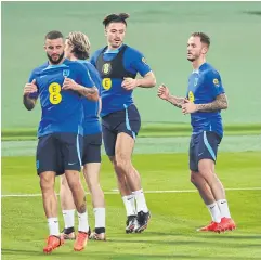  ?? REUTERS ?? England’s James Maddison, right, trains with his England teammates, from left, Kyle Walker, Conor Gallagher and Jack Grealish in Al Wakrah.