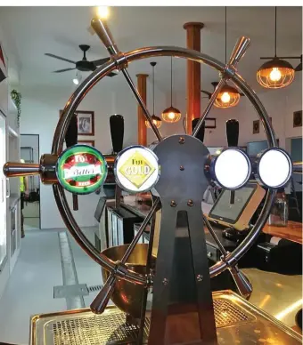  ??  ?? The wheel makes a beautiful feature at the newly renovated bar of the Royal Suva Yacht Club.