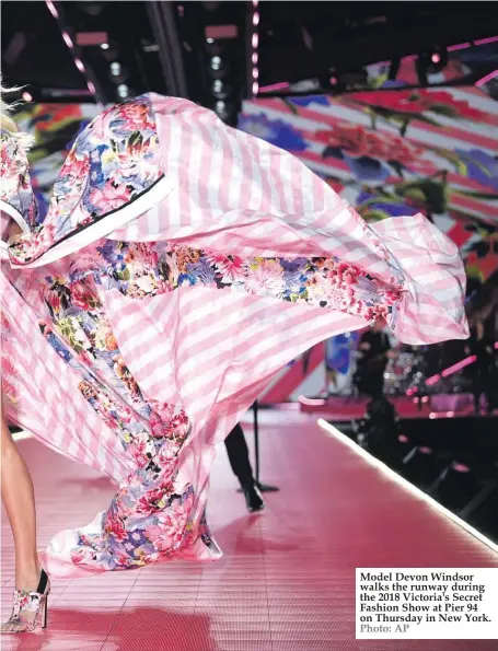  ??  ?? Model Devon Windsor walks the runway during the 2018 Victoria's Secret Fashion Show at Pier 94 on Thursday in New York. Photo: AP