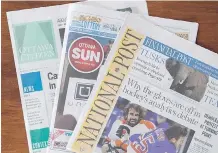  ?? THE CANADIAN PRESS FILES ?? Advertisin­g at Postmedia newspapers has continued to experience declines in recent years.