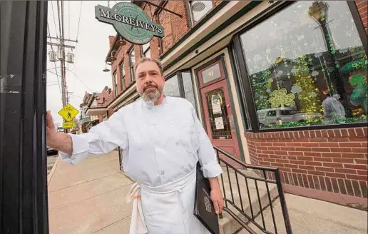  ?? Photos by Lori Van Buren / Times Union ?? Art Riley, chef-ownerof McGreivey's in Waterford, caters to a hometown crowd and is famous for his scalloped potatoes.