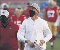  ?? NHAT V. MEYER — BAY AREA NEWS GROUP ?? San Francisco 49ers head coach Kyle Shanahan leaves the field following their 43-17 loss to the Miami Dolphins at Levi’s Stadium in Santa Clara on Oct. 10.