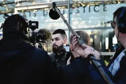  ??  ?? PARIS: Vincent Martinez, one the defendants, speaks to press after three former Air France employees on trial for ripping company executives’ shirts during a dispute over layoffs were found guilty in a case that highlighte­d the country’s sometimes...